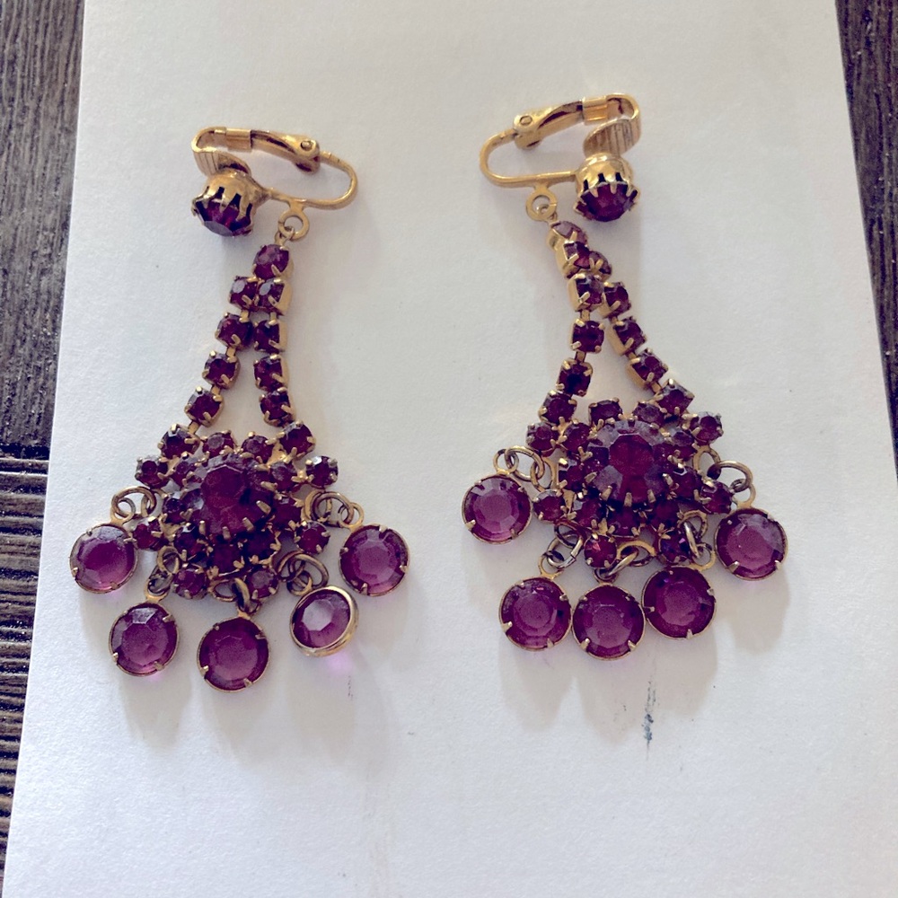 Vintage clip dangling earrings in Gold tone and amethyst.  Dangles perfectly.